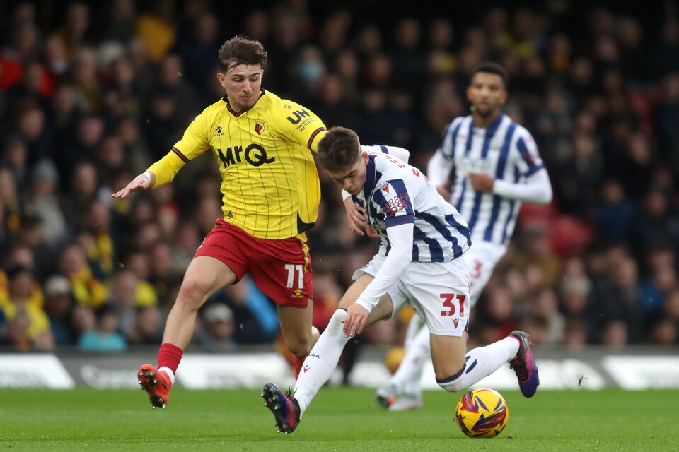 Tom Fellows on the ball at Watford in the home kit 