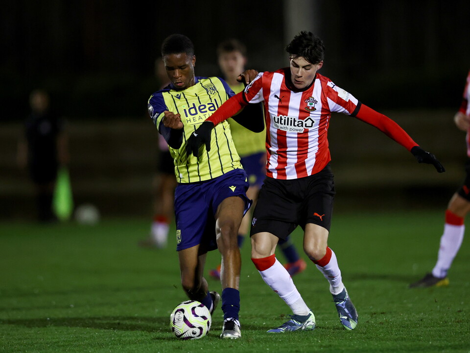 A photo of U21 player Kevin Mfuamba in the yellow and blue 2024/25 away kit