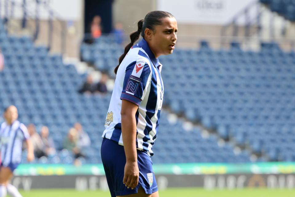 Simran Jhamat in action for Albion Women wearing the home kit 
