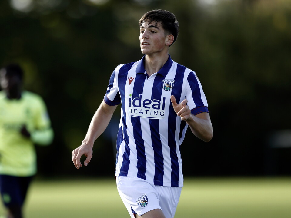 A photo of Albion U18 midfielder Charlie Blackshields in the 2024/25 home kit