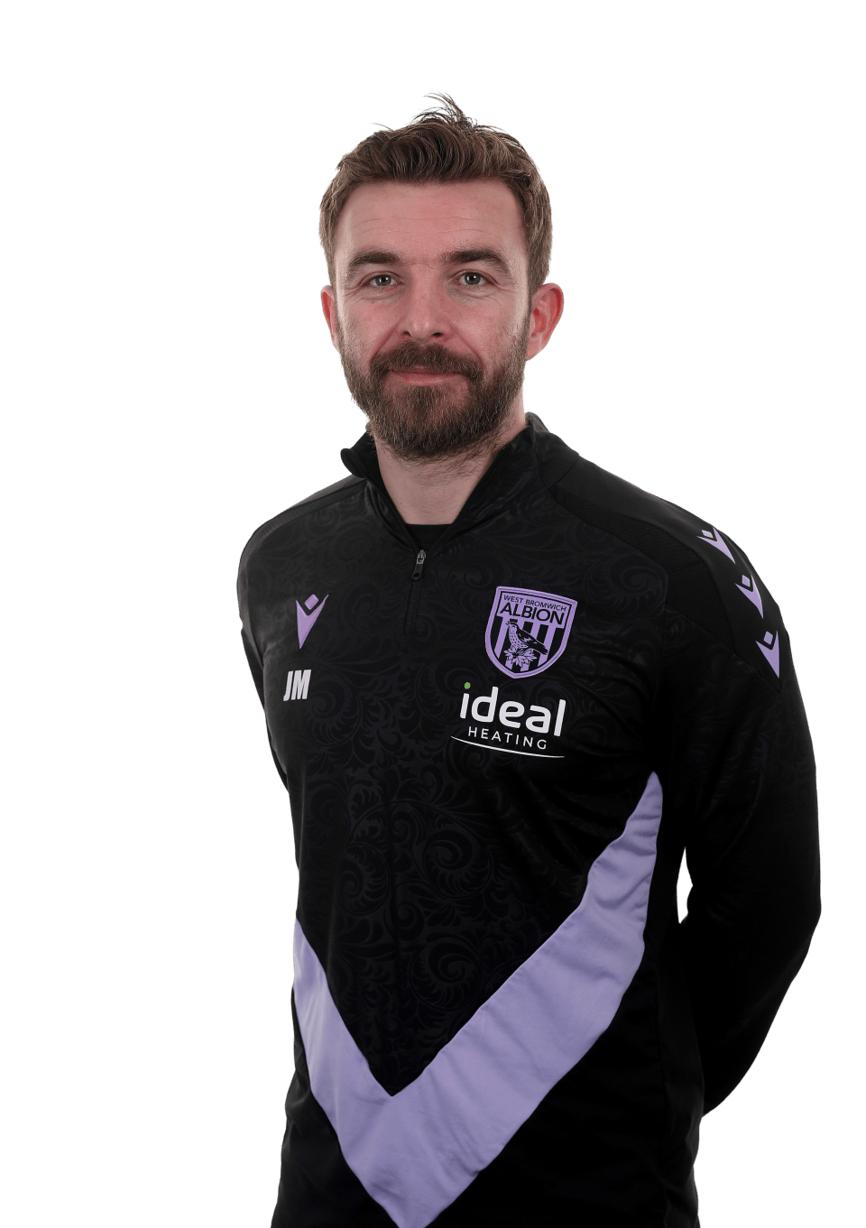 A photo of James Morrison in the 2024/25 purple and black trainingwear