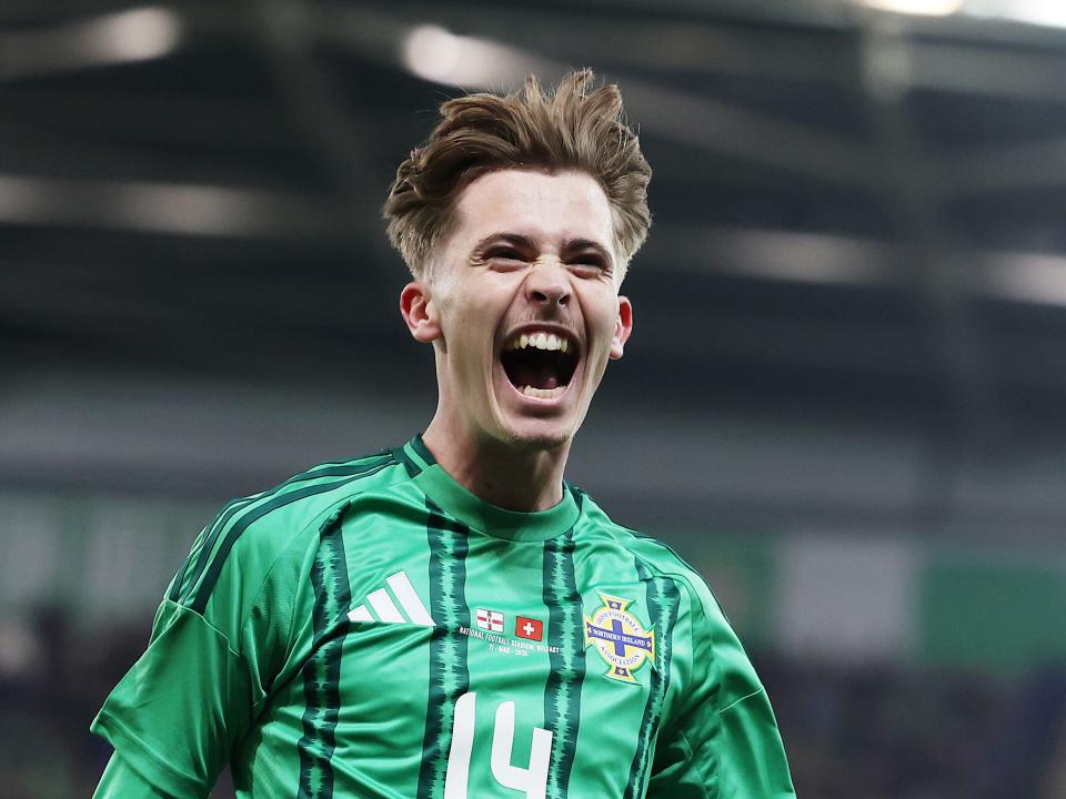 Isaac Price celebrates scoring a goal for Northern Ireland against Switzerland