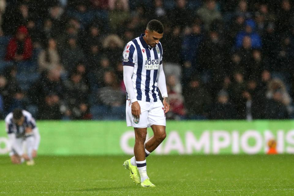 Karlan Grant looking dejected in the home kit at The Hawthorns 