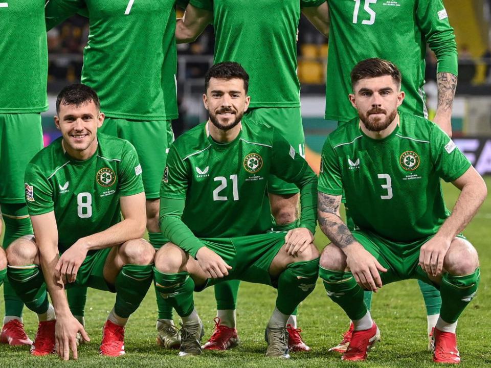Mikey Johnston kneeling down for the Ireland team photo v Bulgaria in the green home kit 