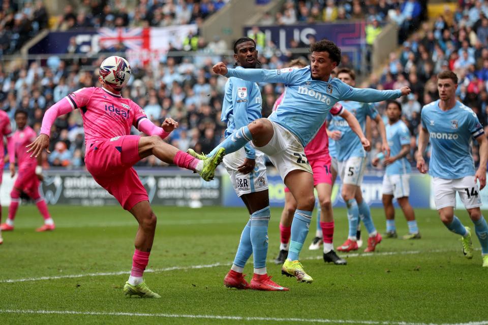 General match action of a packed penalty area between Coventry and Albion 