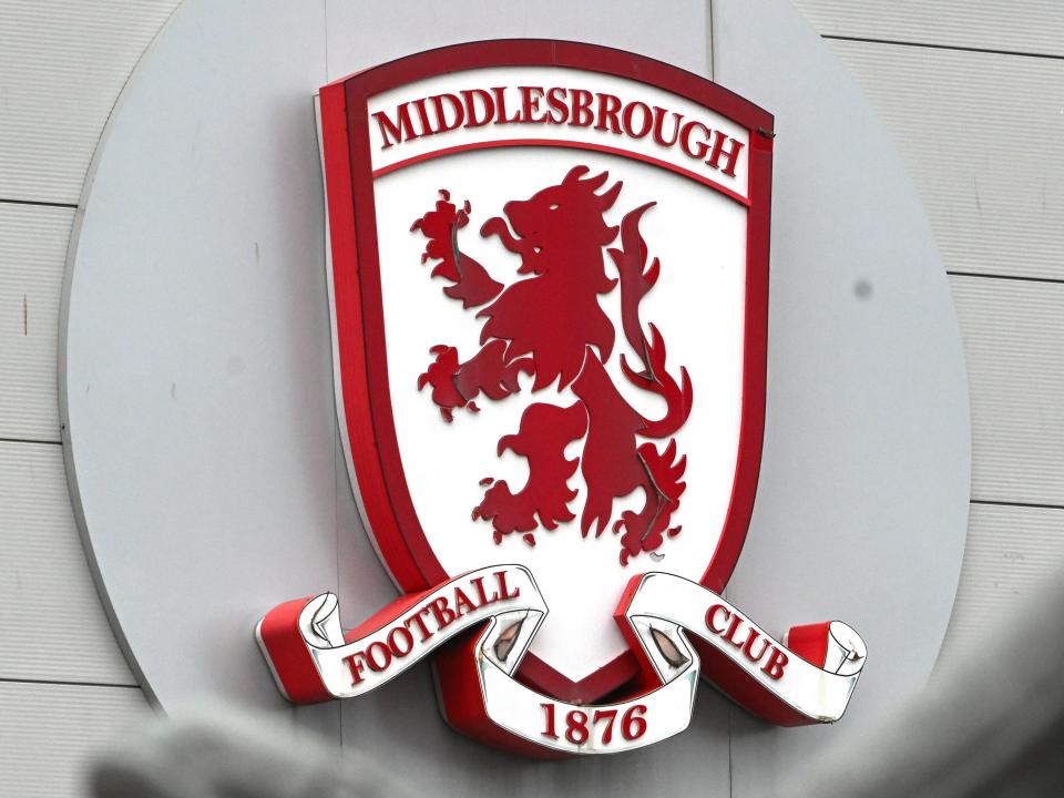 A photo of the Middlesbrough badge on the side of the stadium