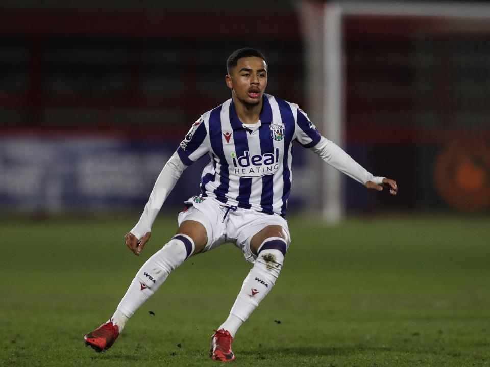 A photo of Albion U21 defender Deago Nelson in the 2024/25 home kit