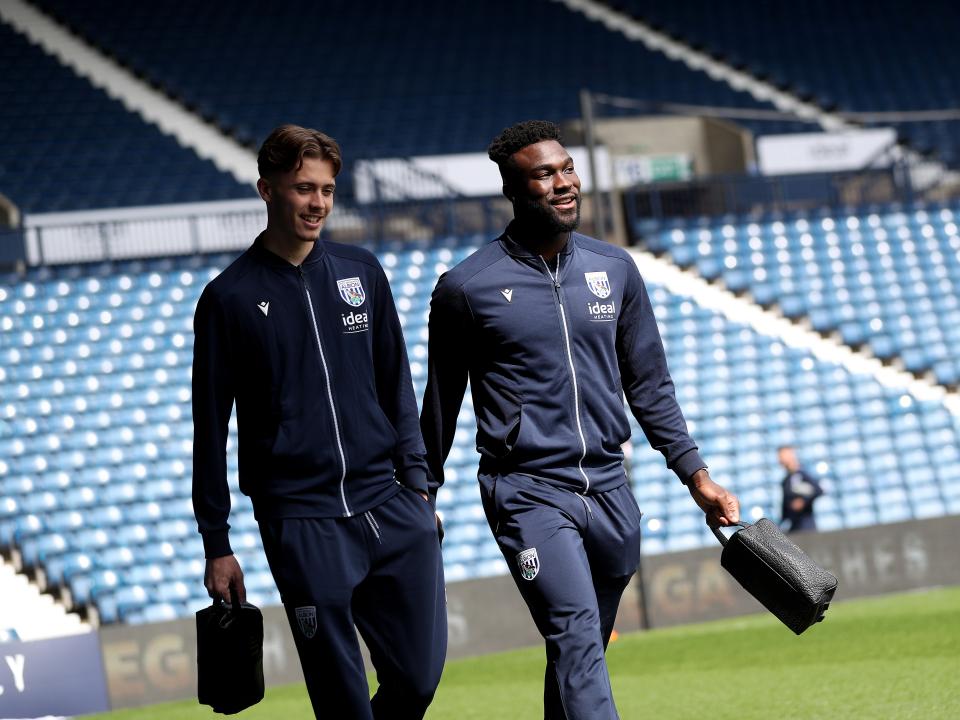 An image of Dike and Price arriving at The Hawthorns