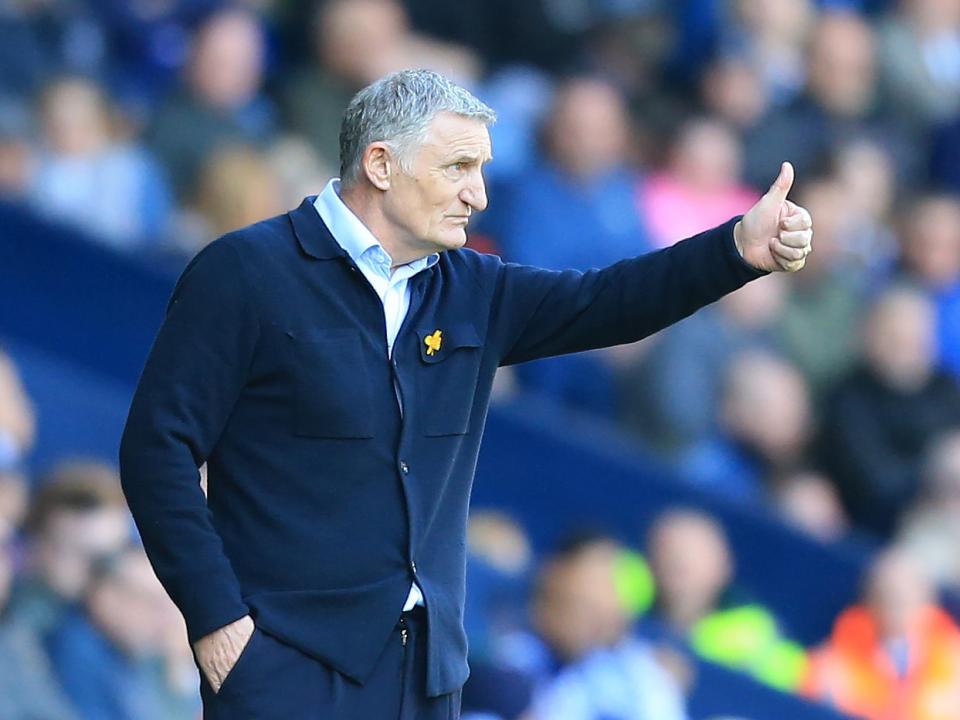 Tony Mowbray with his thumb up on the side of the pitch at The Hawthorns