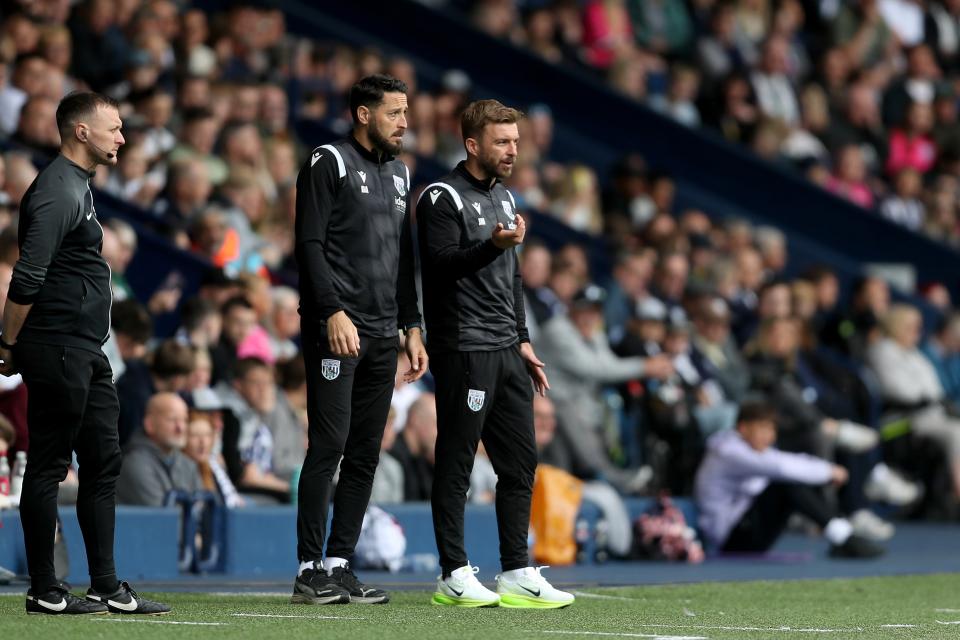 James Morrison and Damia Abella on the side of the pitch at The Hawthorns in the game against Luton