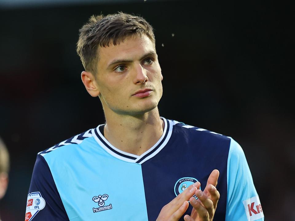 A dejected-looking Caleb Taylor in a Wycombe shirt 