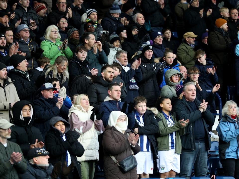 An image of West Bromwich Albion supporters appluading