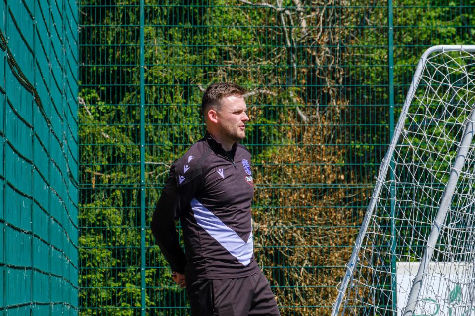 Head Coach Richard Henderson.
