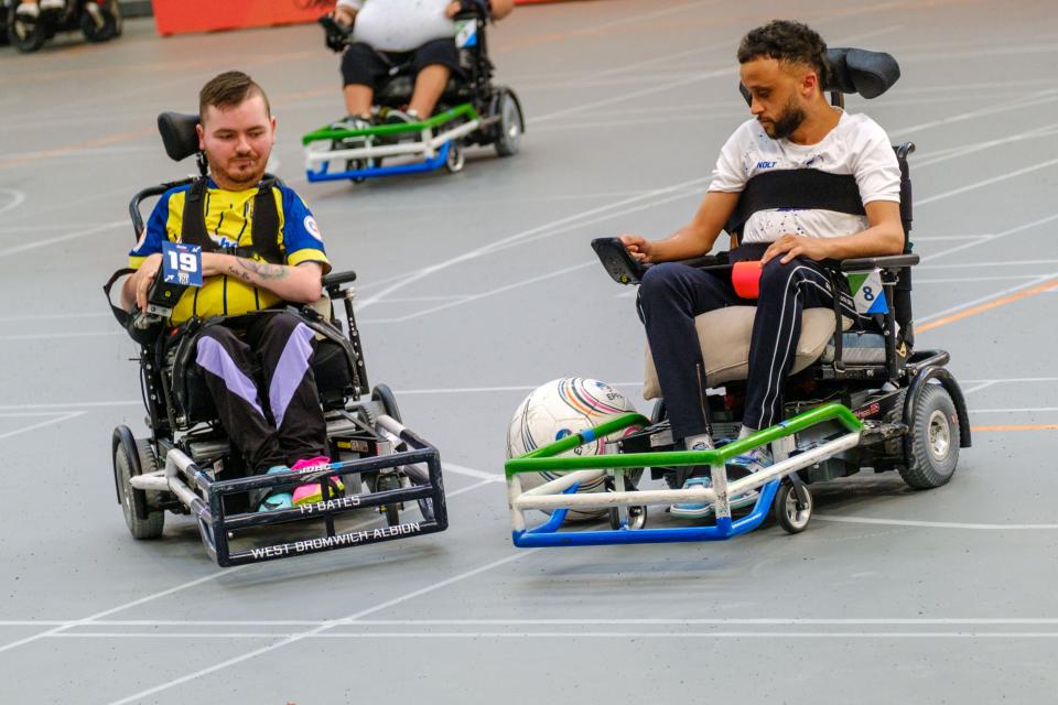 Brad Bates competes for possession.