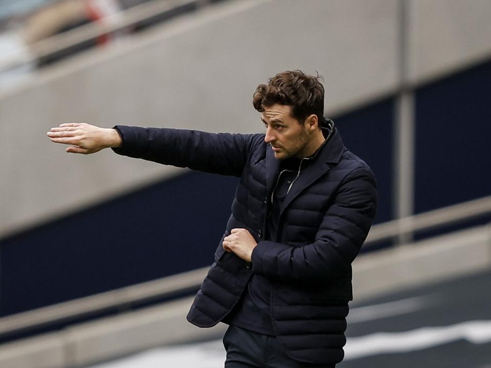 An image of Ryan Mason coaching Spurs