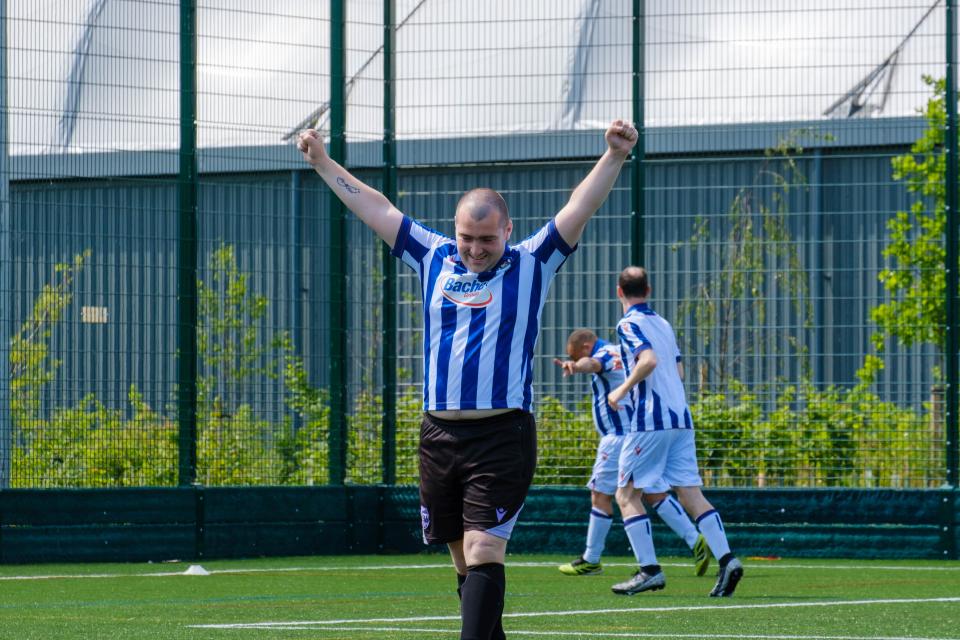 Adam celebrates.