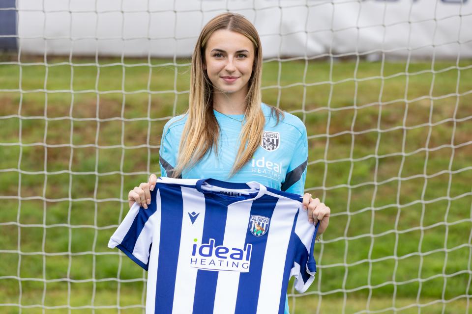 Ruby Heselden with an Albion home shirt.