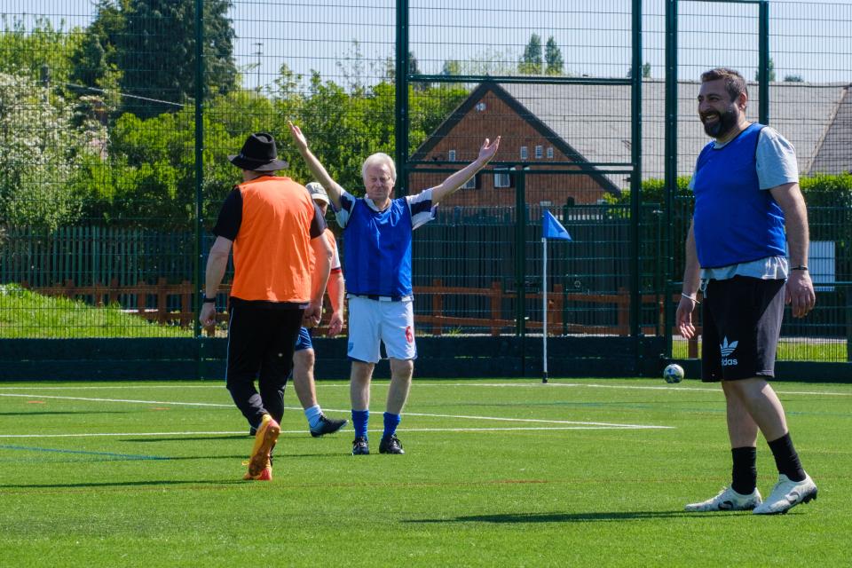 A participant celebrates at our Cancer Kickers session.