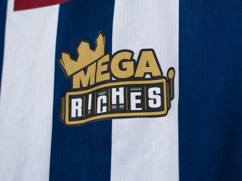An image of an Albion shirt with the Mega Riches logo on it
