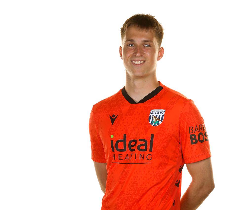 A photo of Albion U21 goalkeeper Joe Wallis in the 2025/26 orange keeper kit