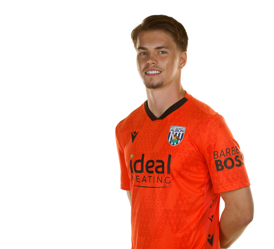 A photo of Albion goalkeeper Josh Griffiths in the 2025/26 orange keeper kit