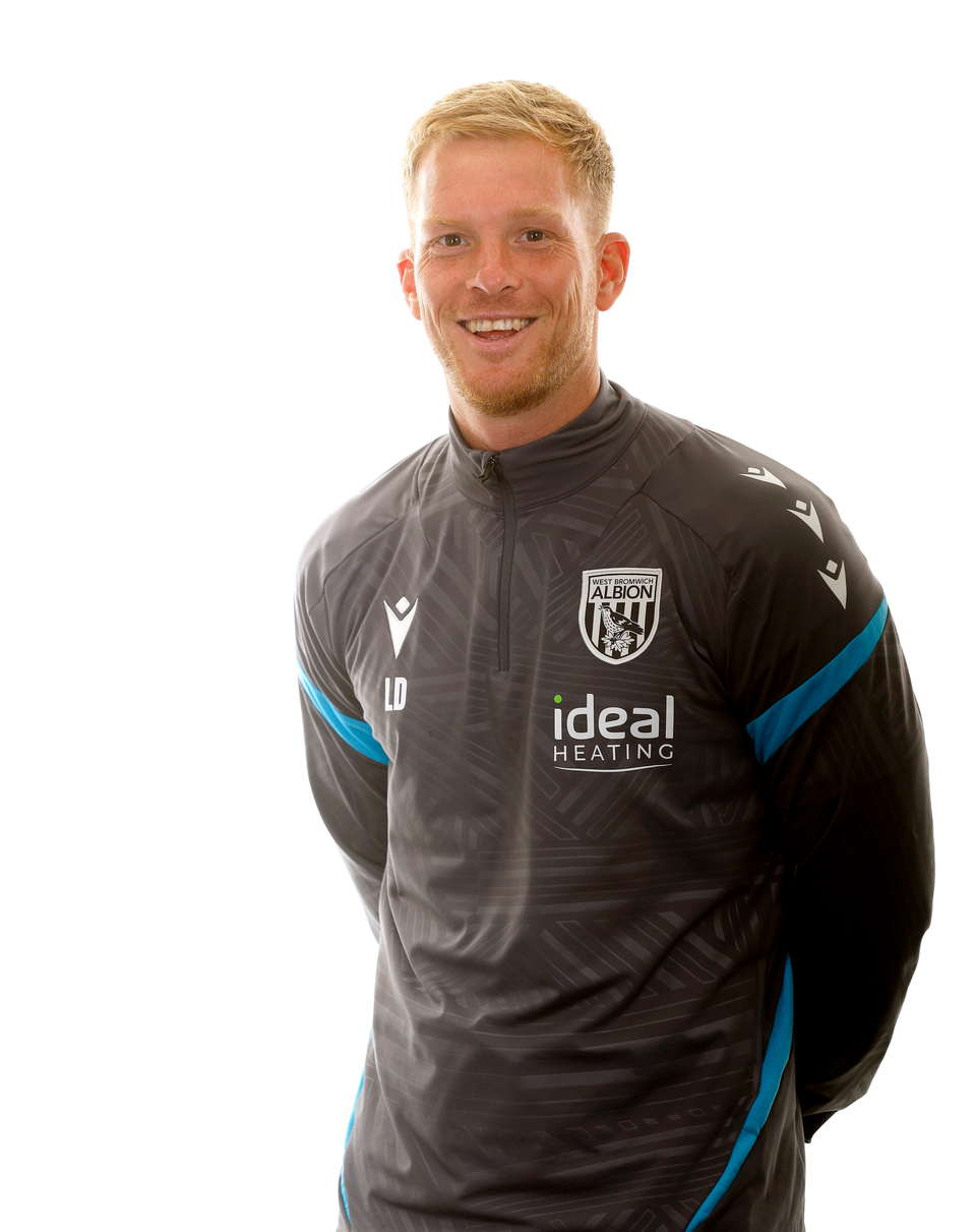 A photo of Albion Lead U18 PDP Coach Leigh Downing in the 2025/26 grey training kit