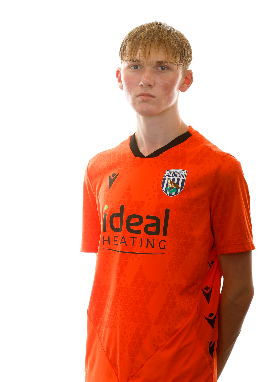 A photo of Albion U18 goalkeeper Liam Wilkes in the home orange goalkeeper kit