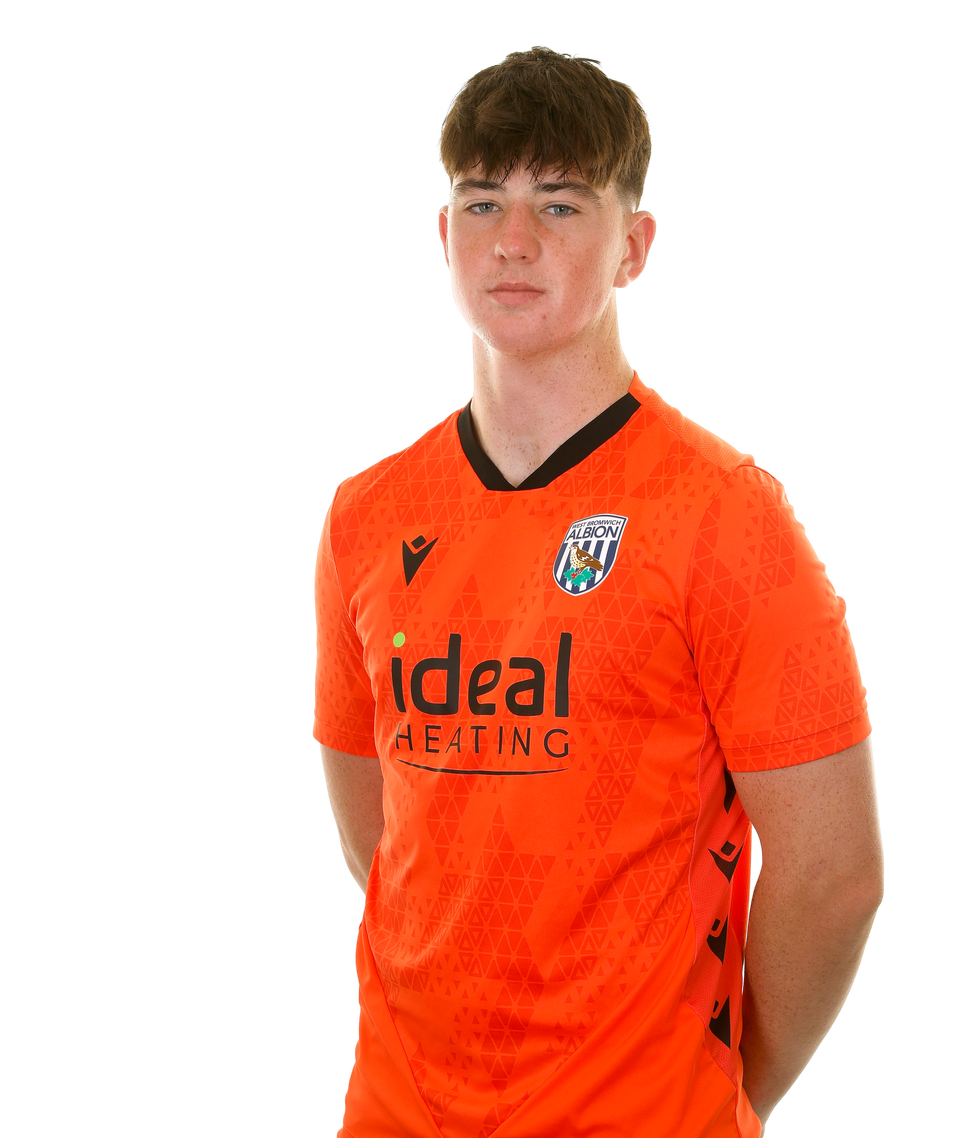 A photo of Albion U21 goalkeeper Louis Brady in the 2025/26 orange keeper kit