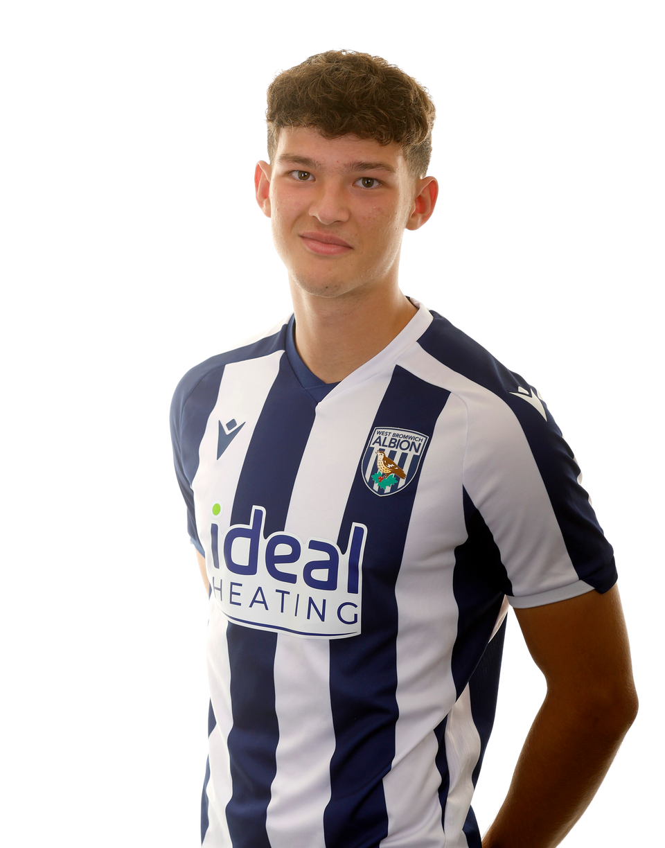 A photo of Albion U18 defender Noah DuPont in the 2025/26 home kit