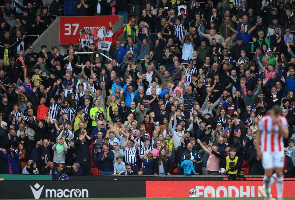 A general view of West Bromwich Albion fans cheering after a goal at Stoke City in August 2024
