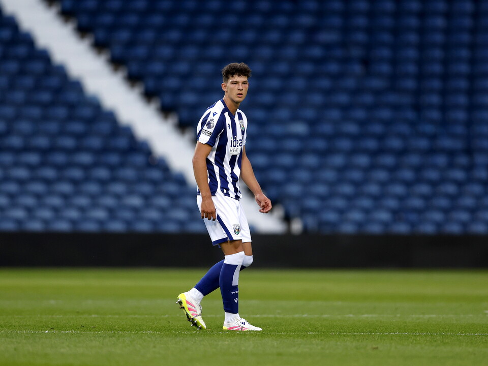 A photo of Albion U18 defender Noah DuPont in the 2025/26 home kit