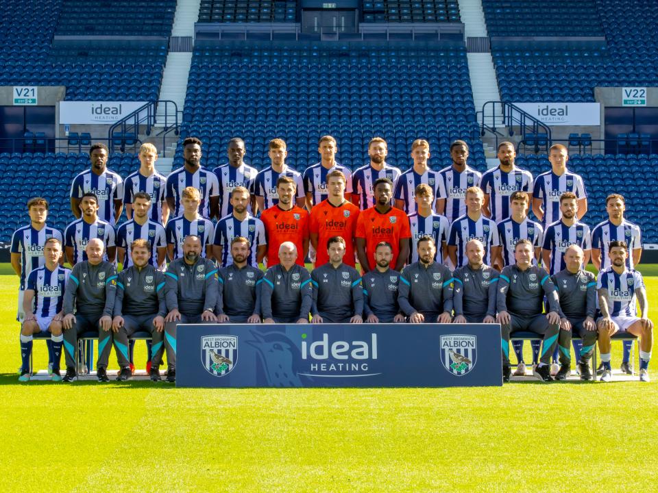 Albion's 2025/26 squad posing for a team photo on the pitch at The Hawthorns in the home kit