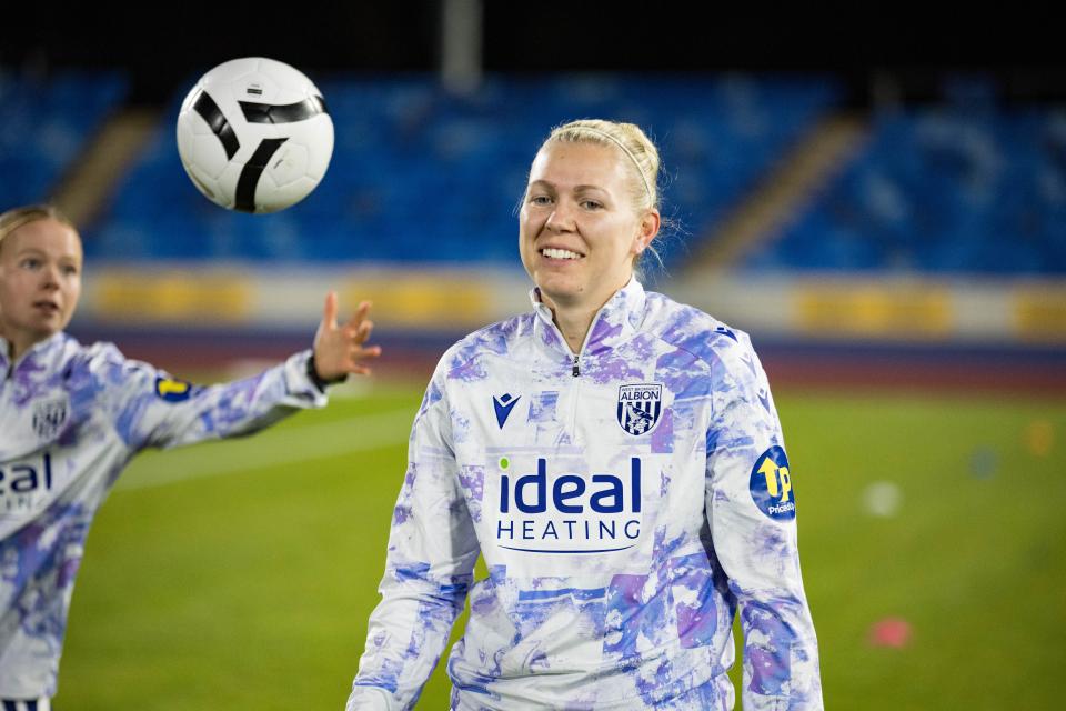 Hannah George warming up.