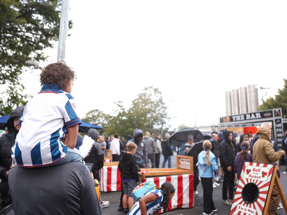A general view of Albion fans in the Fan Zone 
