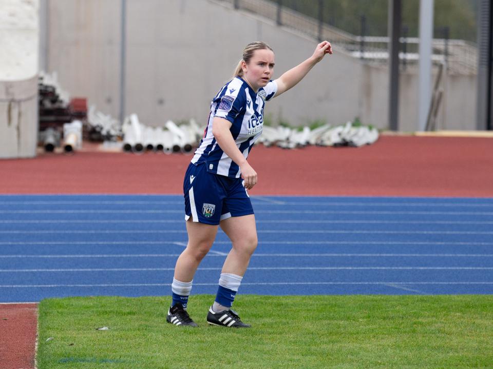 Ella Haughey taking a corner in the home kit 