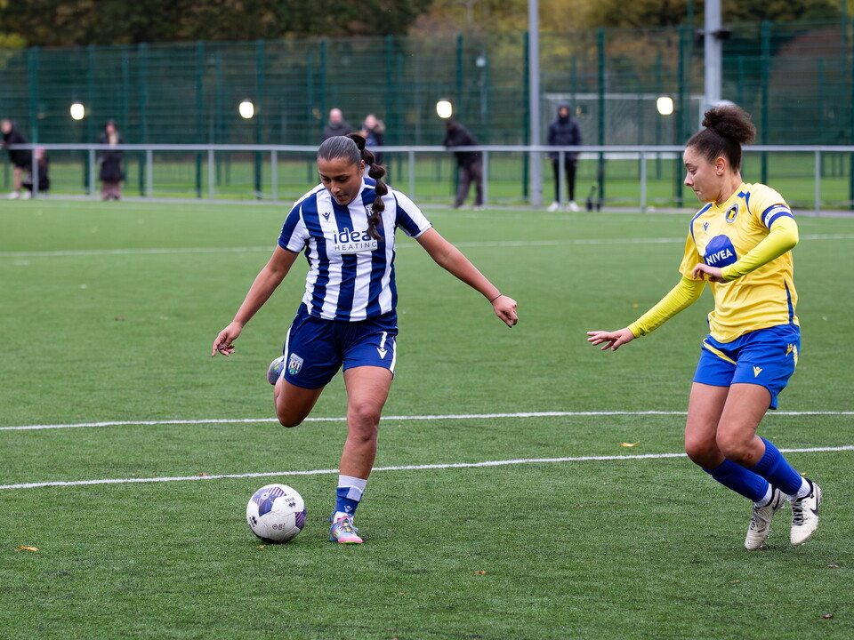 Simran Jhamat on the ball against Solihull in the home kit 