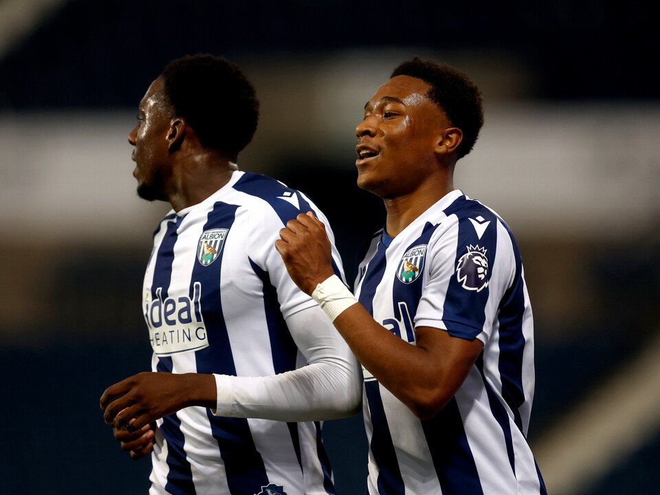 A photo of Jaiden Francis Caeser celebrating a goal. 