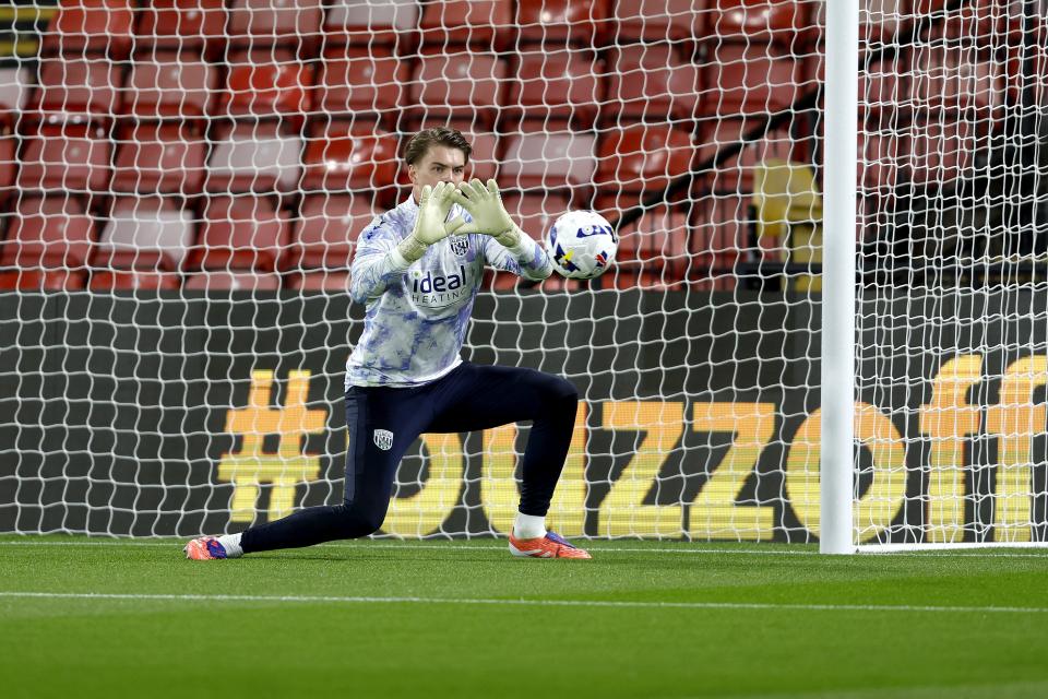 A photo of Josh Griffiths warming up