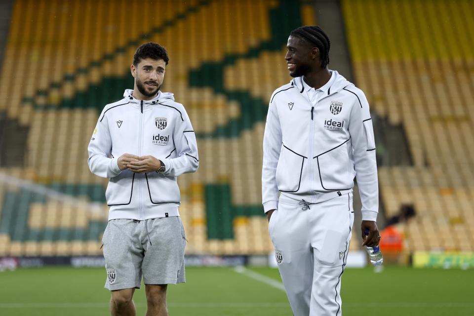 A photo of Mikey and Iling junior before the game.