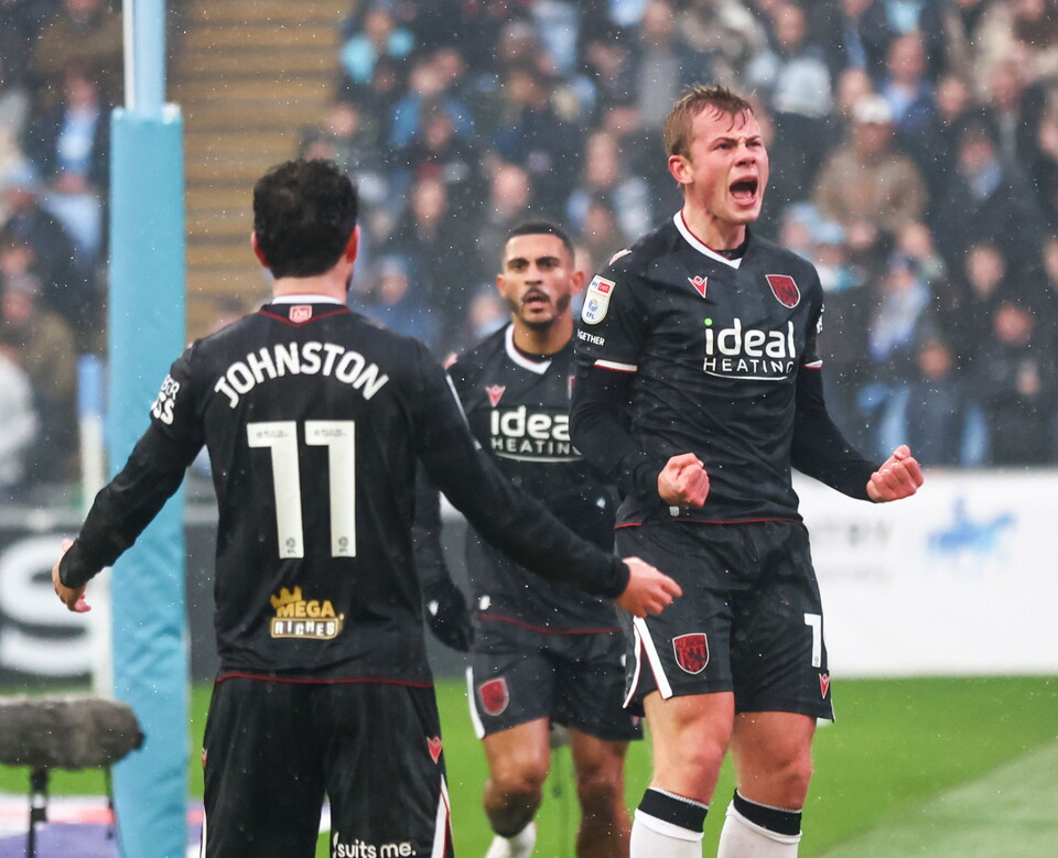 A photo of Heggebo and Johnston Celebrating at Coventry.