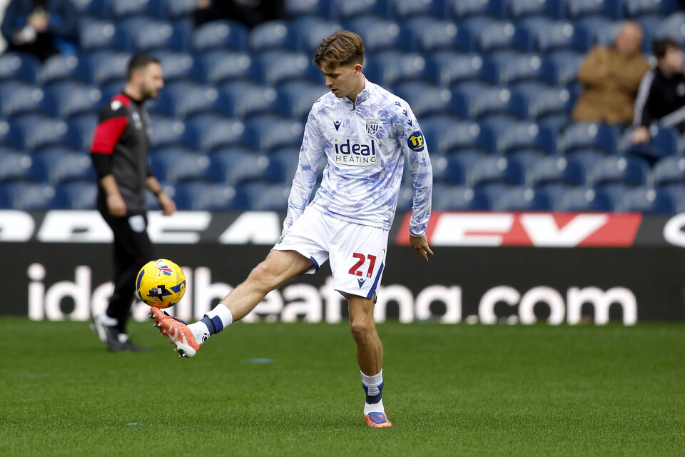 A photo of Isaac Price warming up 