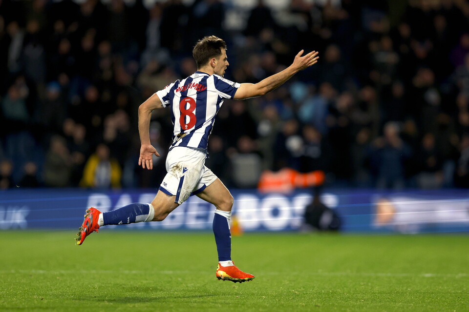 A photo of Jayson Molumby celebrating 
