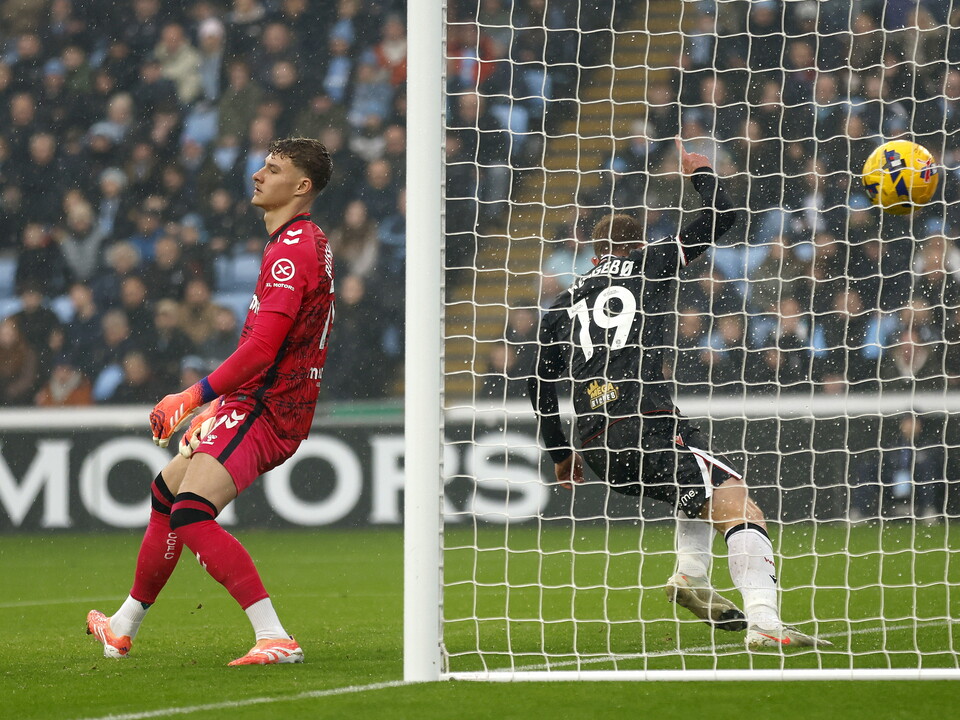An image of Aune Heggebo scoring against Coventry