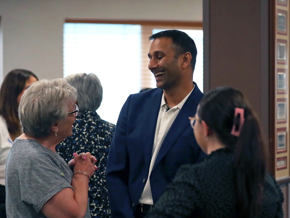 Shilen Patel laughing with fans 