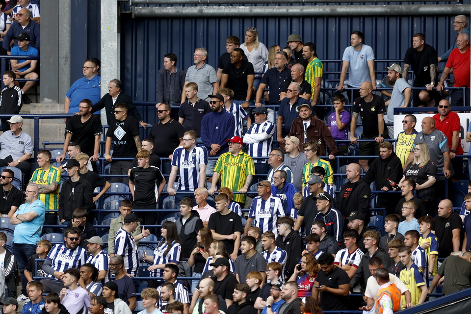A general view of fans in the safe standing area at The Hawthorns