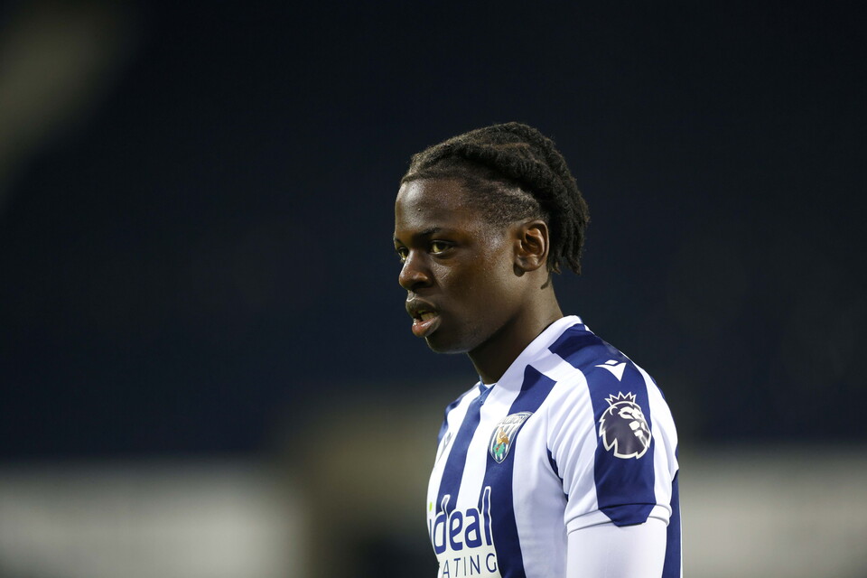 Torin Ntege in action for the PL2 team in the home kit 