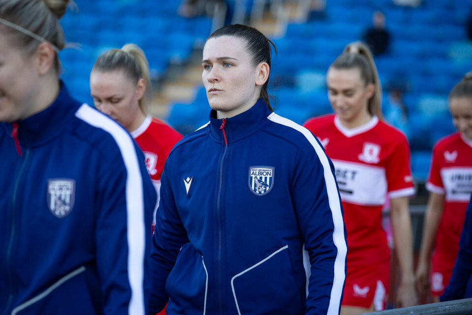 Charlotte Clarke walks out at the Alexander Stadium.