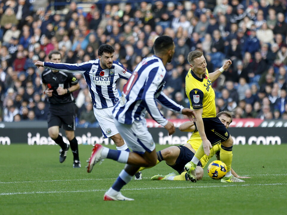 An image of Mikey Johnston shooting against Oxford