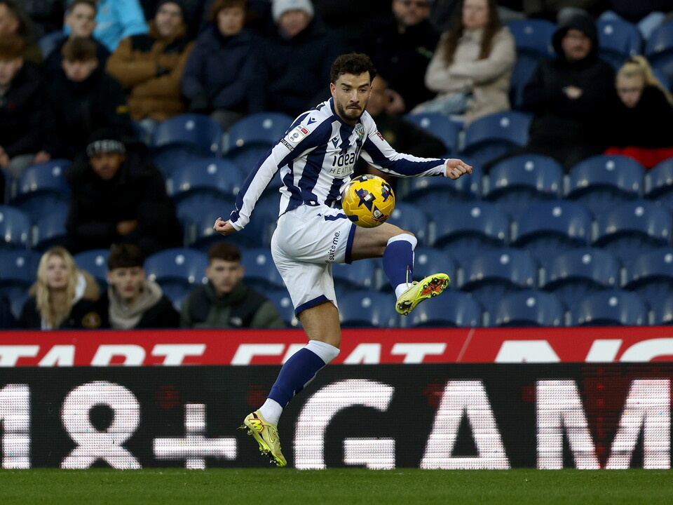 An image of Mikey Johnston playing against Swansea