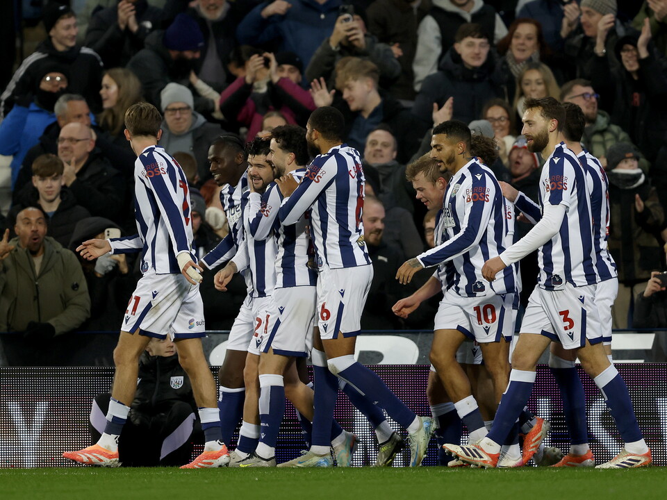 An image of the team celebrating Alex Mowatt's goal against Birmingham